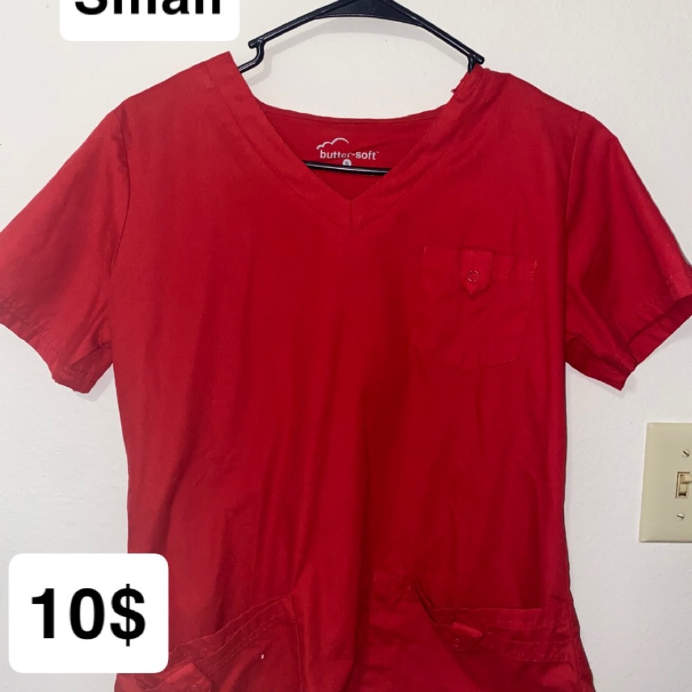 Selling some old scrubs :) none come with pants except the red pair.